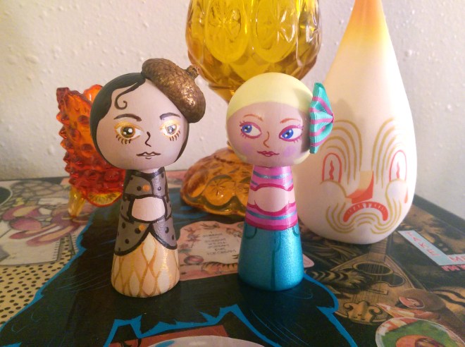 Each of them just has to have SOMETHING on her head. Yes, that is a real acorn on the left, brushed gold and sealed. I was on a hike and quite literally exclaimed to my boyfriend, "They look like mini hats!!!" and started frantically collecting as many as possible. I knew they would come to good use one day!