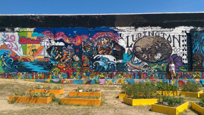 Me posing oh-so-cool in front of my favorite mural of the bunch.