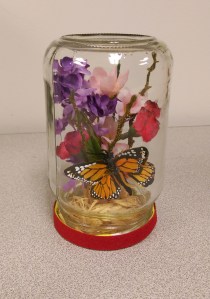 Decorative Terrarium by Colleen : It's amazing what you can do with some fake plants , ribbon, and raffia.